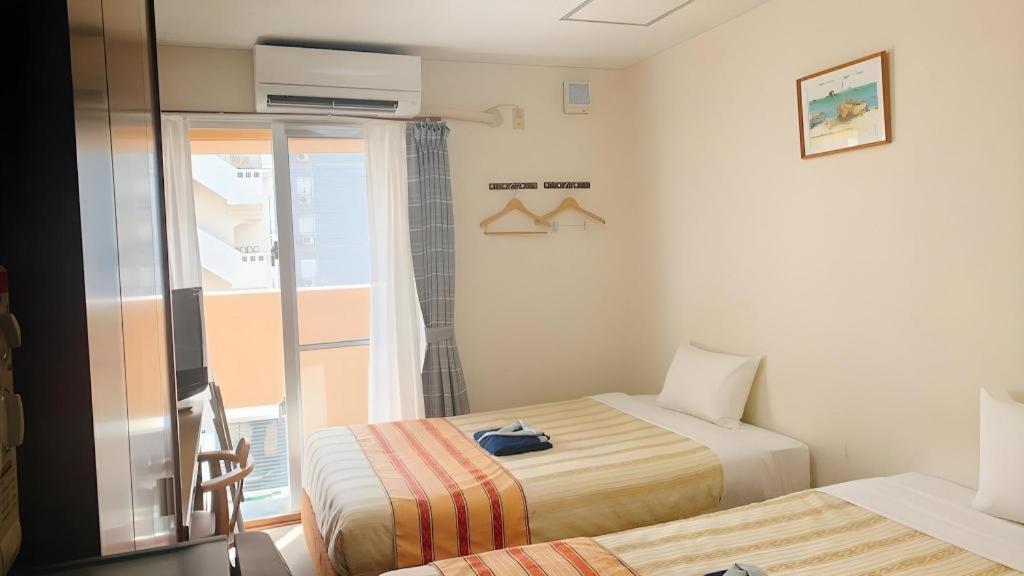 Hotel Peace Land Kume Naha Exteriör bild