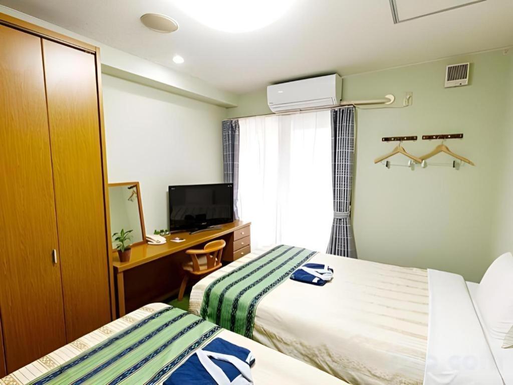 Hotel Peace Land Kume Naha Exteriör bild
