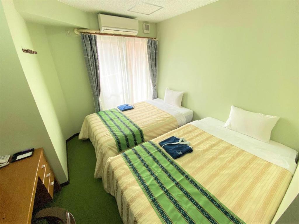 Hotel Peace Land Kume Naha Exteriör bild